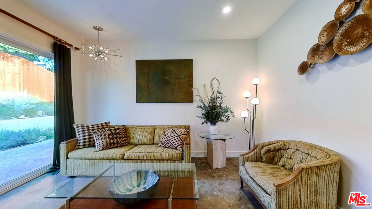1237 Montecito Drive Los Angeles, CA 90031 - Photo 11 of 26 a living room with furniture and a window