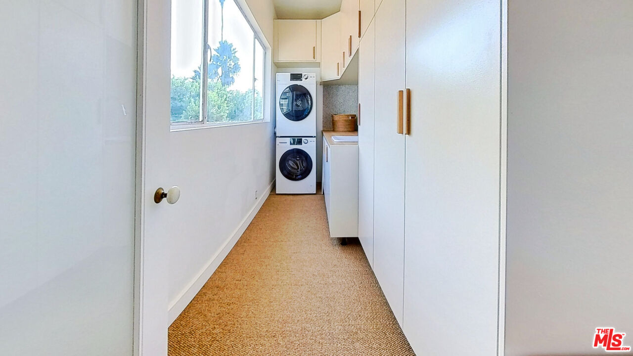 1237 Montecito Drive Los Angeles, CA 90031 - Photo 16 of 26 view of a hallway with washer and dryer