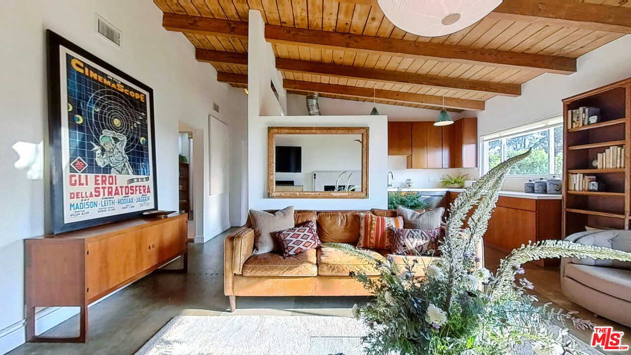 1237 Montecito Drive Los Angeles, CA 90031 - Photo 2 of 26 a living room with furniture and a potted plant
