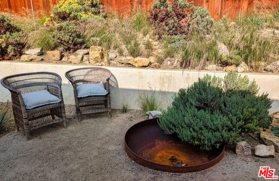 1237 Montecito Drive Los Angeles, CA 90031 - Photo 21 of 26 a view of a backyard with plants and lake