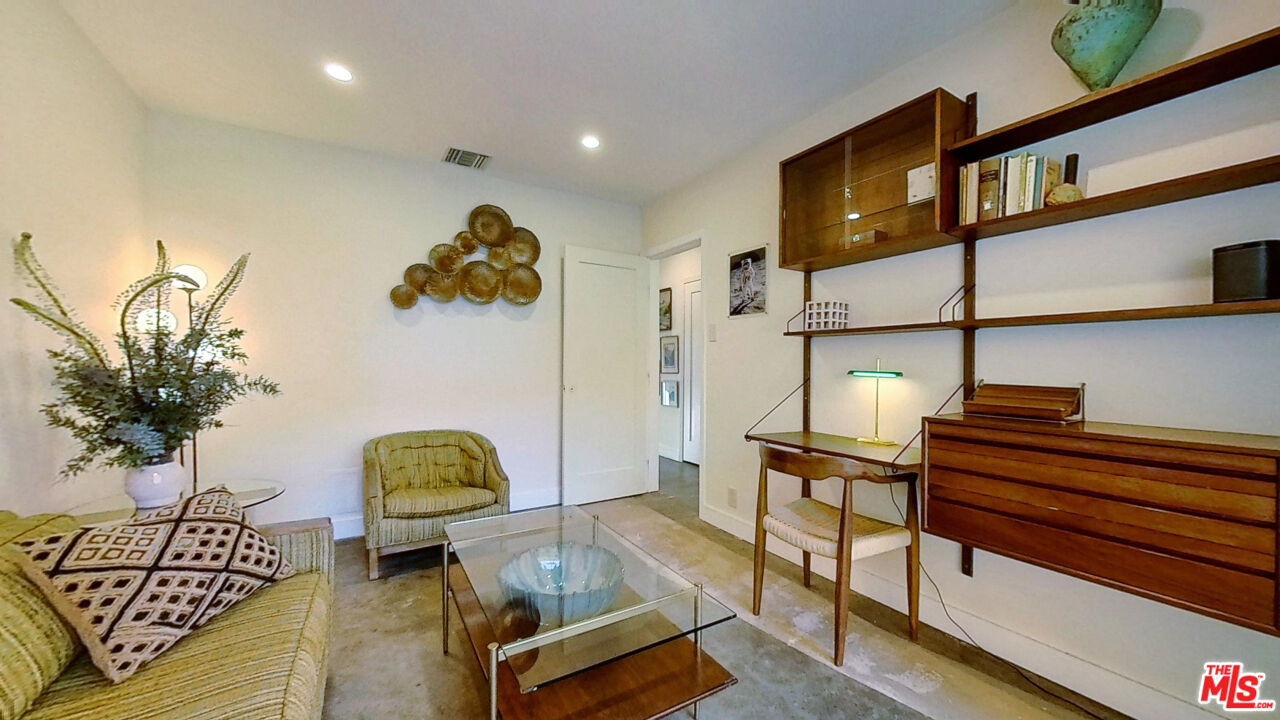 1237 Montecito Drive Los Angeles, CA 90031 - Photo 24 of 26 a living room with furniture and a potted plant