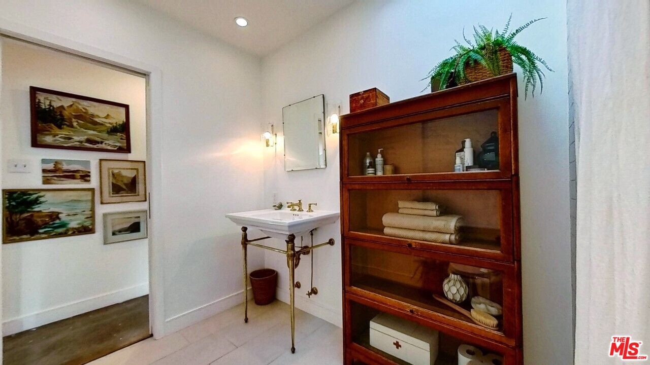 1237 Montecito Drive Los Angeles, CA 90031 - Photo 25 of 26 a view of workspace with wooden floor and cabinet