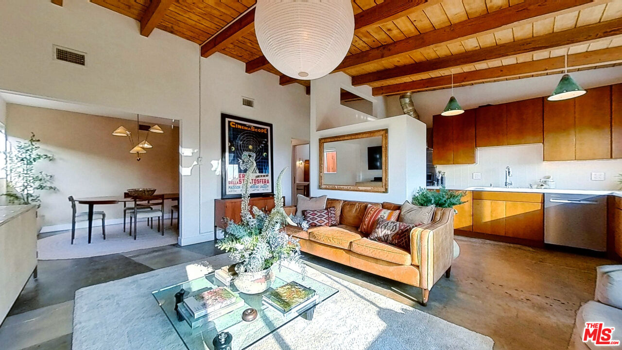 1237 Montecito Drive Los Angeles, CA 90031 - Photo 3 of 26 a living room with furniture kitchen view and a chandelier