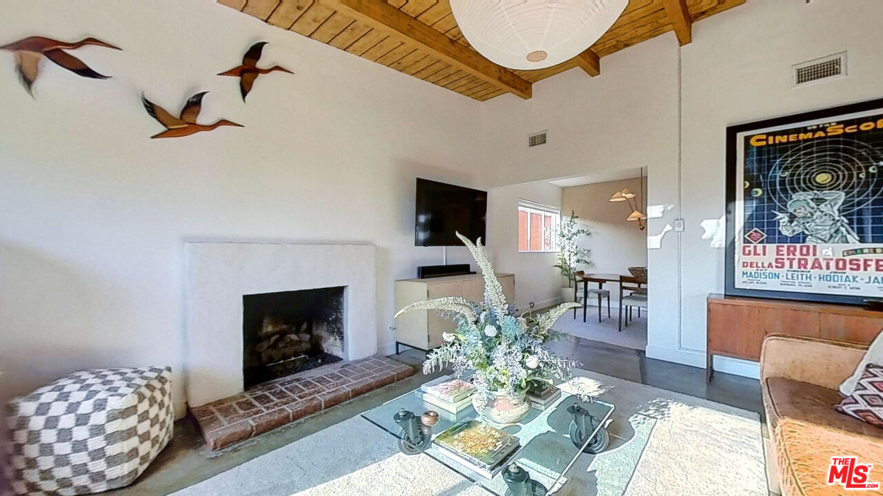 1237 Montecito Drive Los Angeles, CA 90031 - Photo 4 of 26 a living room with furniture fireplace and wooden floor