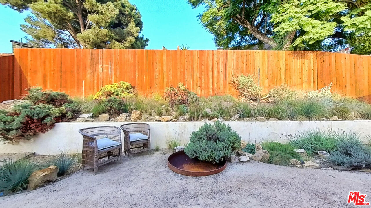 1237 Montecito Drive Los Angeles, CA 90031 - Photo 10 of 26 a backyard of a house with a yard and outdoor seating