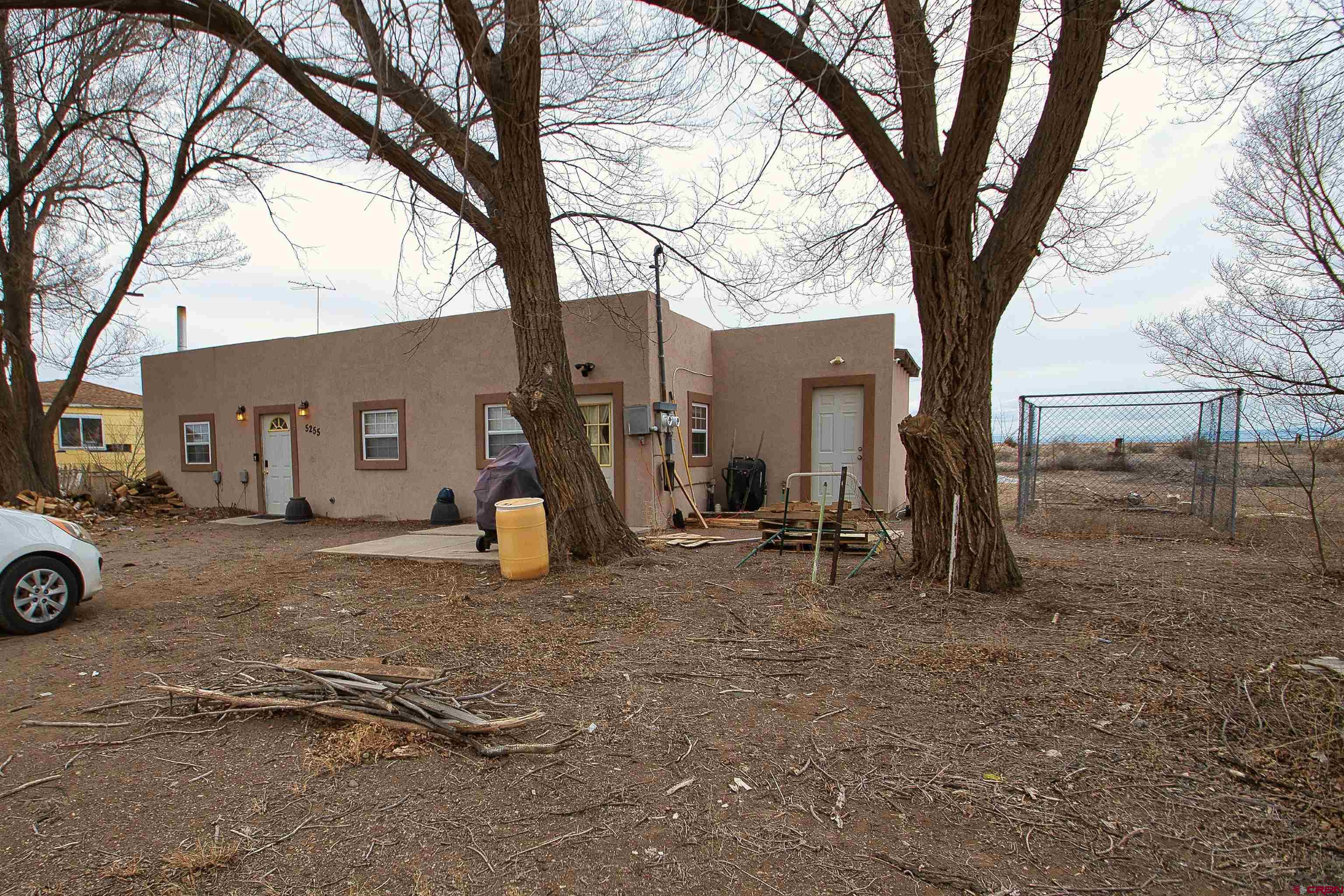 5255 Oviatt Street Mosca, CO 81146 - Photo 10 of 10 a view of a house with a yard