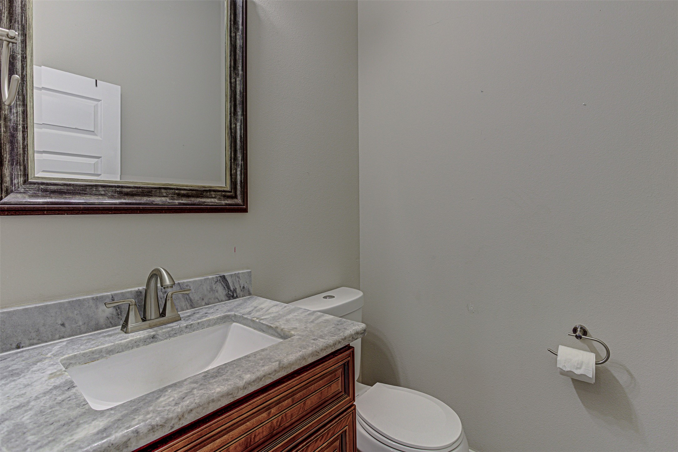105 Arbors Circle Elgin, TX 78621 - Photo 25 of 40 Half bathroom featuring vanity and toilet