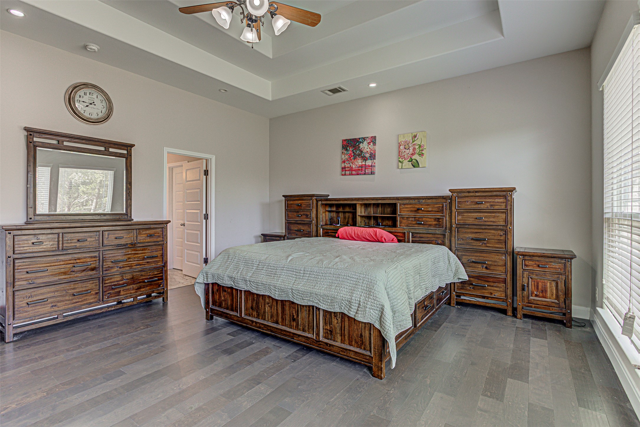 105 Arbors Circle Elgin, TX 78621 - Photo 27 of 40 Bedroom with ceiling fan, wood finished floors, and recessed lighting