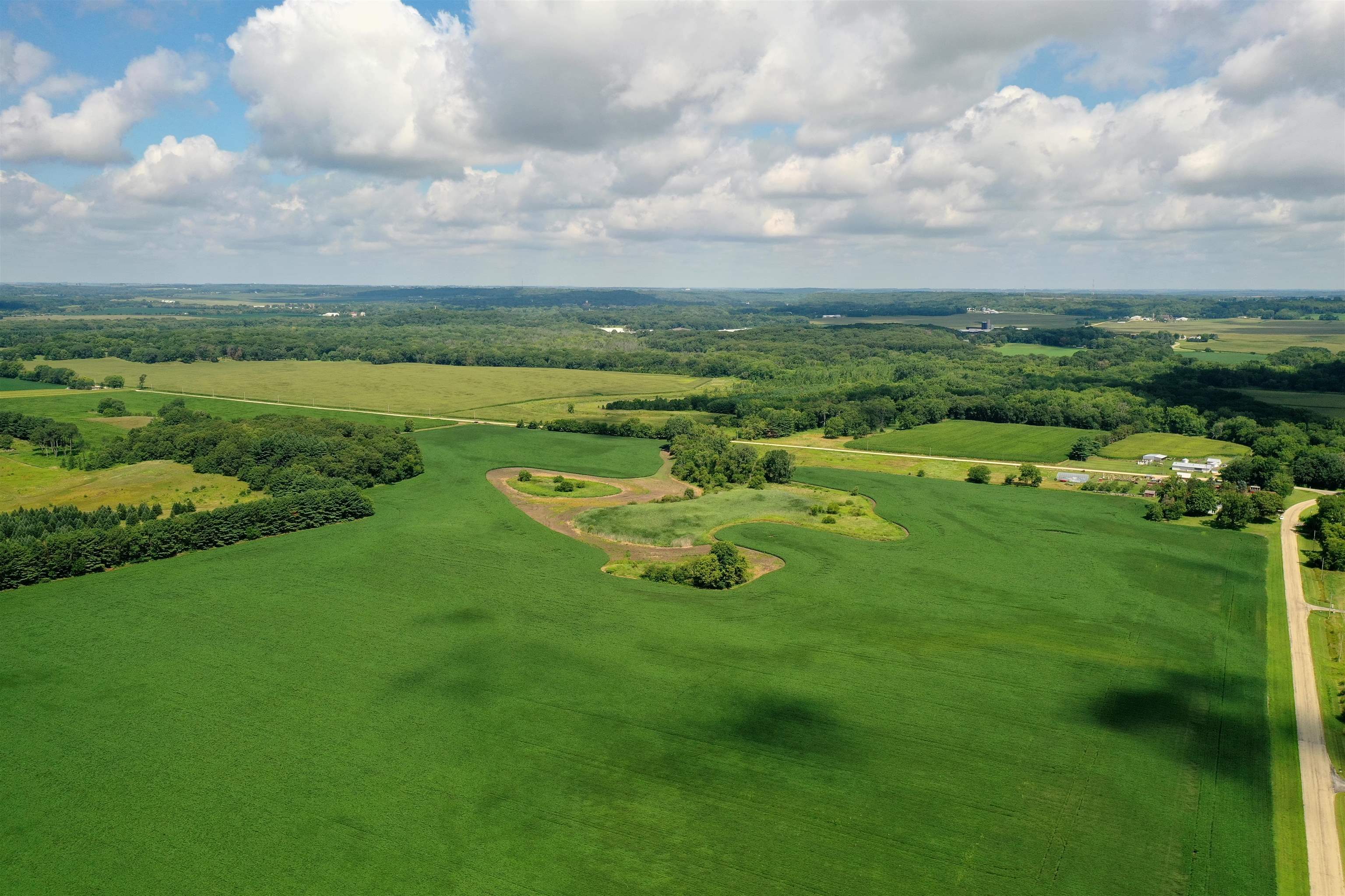 0 South Watertown Road Oregon, IL 61061 - Photo 3 of 14 a view of a golf course with a lake view