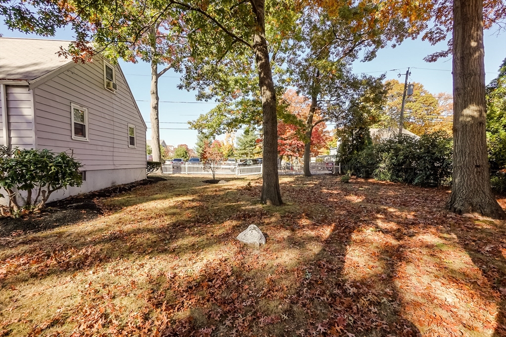5 Oliver Street Randolph, MA 02368 - Photo 6 of 29 a view of a yard with trees