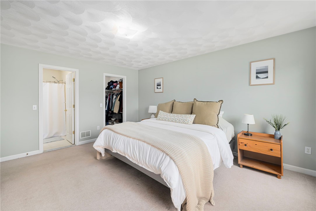 75 MacBeth Street Cranston, RI 02920 - Photo 20 of 45 Primary bedroom has direct access to the floor's full bathroom