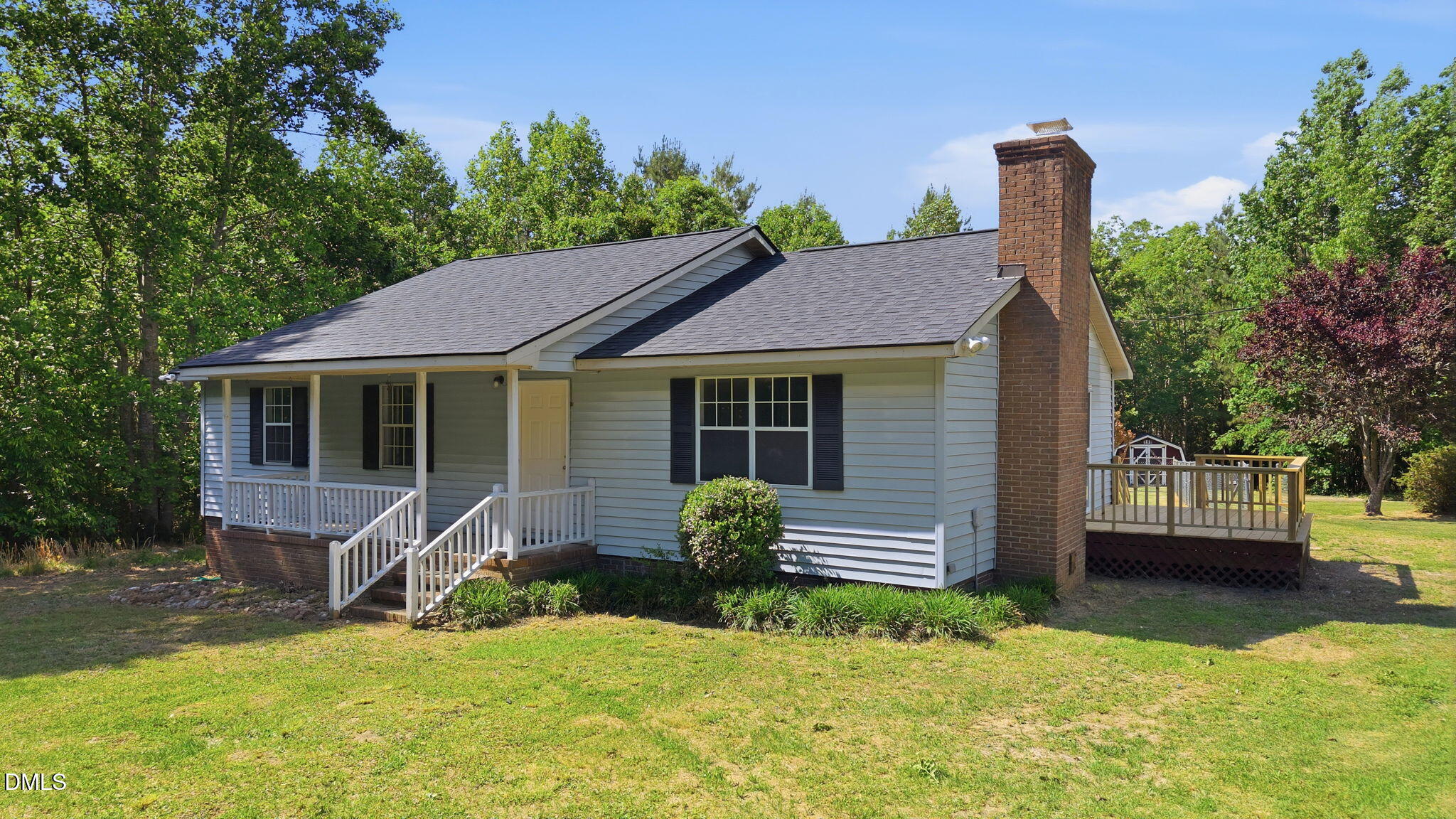 3602 Harrison Road Castalia, NC 27816 - Photo 3 of 48 a view of a house with a yard and sitting area