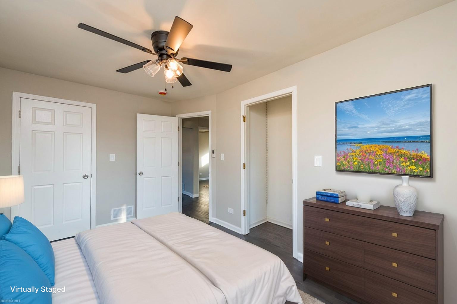 821 12th Street North Chicago, IL 60064 - Photo 20 of 25 a bedroom with a bed and a flat screen tv