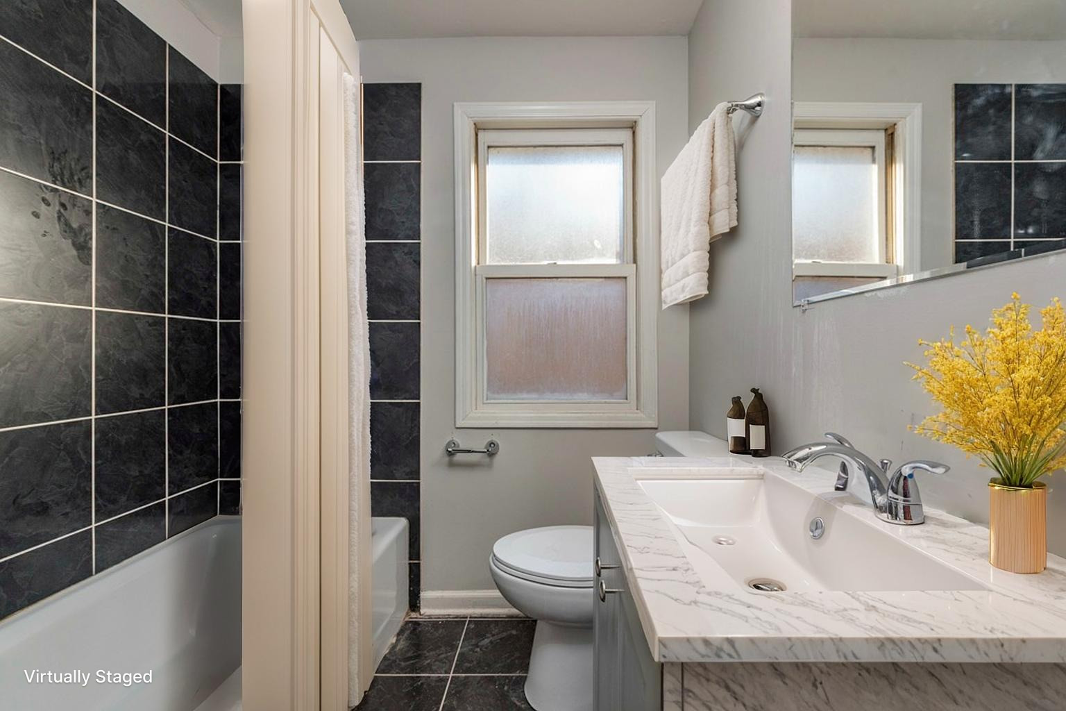 821 12th Street North Chicago, IL 60064 - Photo 21 of 25 a bathroom with a sink toilet and shower
