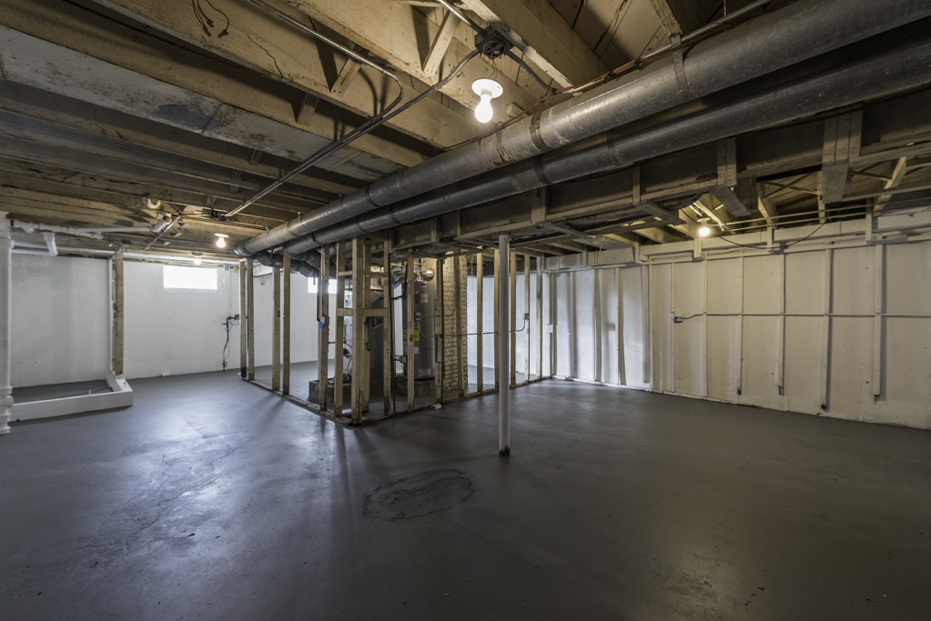 821 12th Street North Chicago, IL 60064 - Photo 22 of 25 a view of an empty room with wooden walls