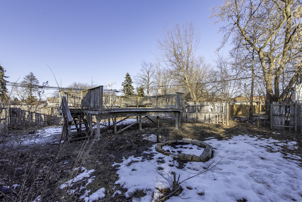 821 12th Street North Chicago, IL 60064 - Photo 24 of 25 a backyard of a house with table and chairs
