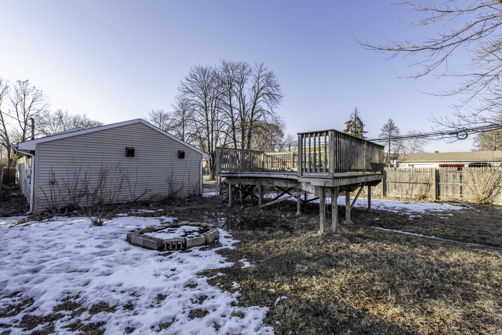 821 12th Street North Chicago, IL 60064 - Photo 25 of 25 a backyard of a house with table and chairs