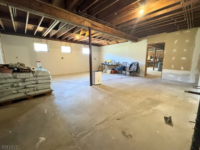 a view of a livingroom with furniture