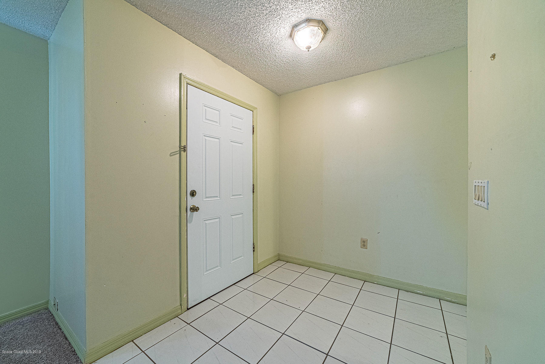 449 Lisa Road Northeast Palm Bay, FL 32907 - Photo 5 of 29 Entrance