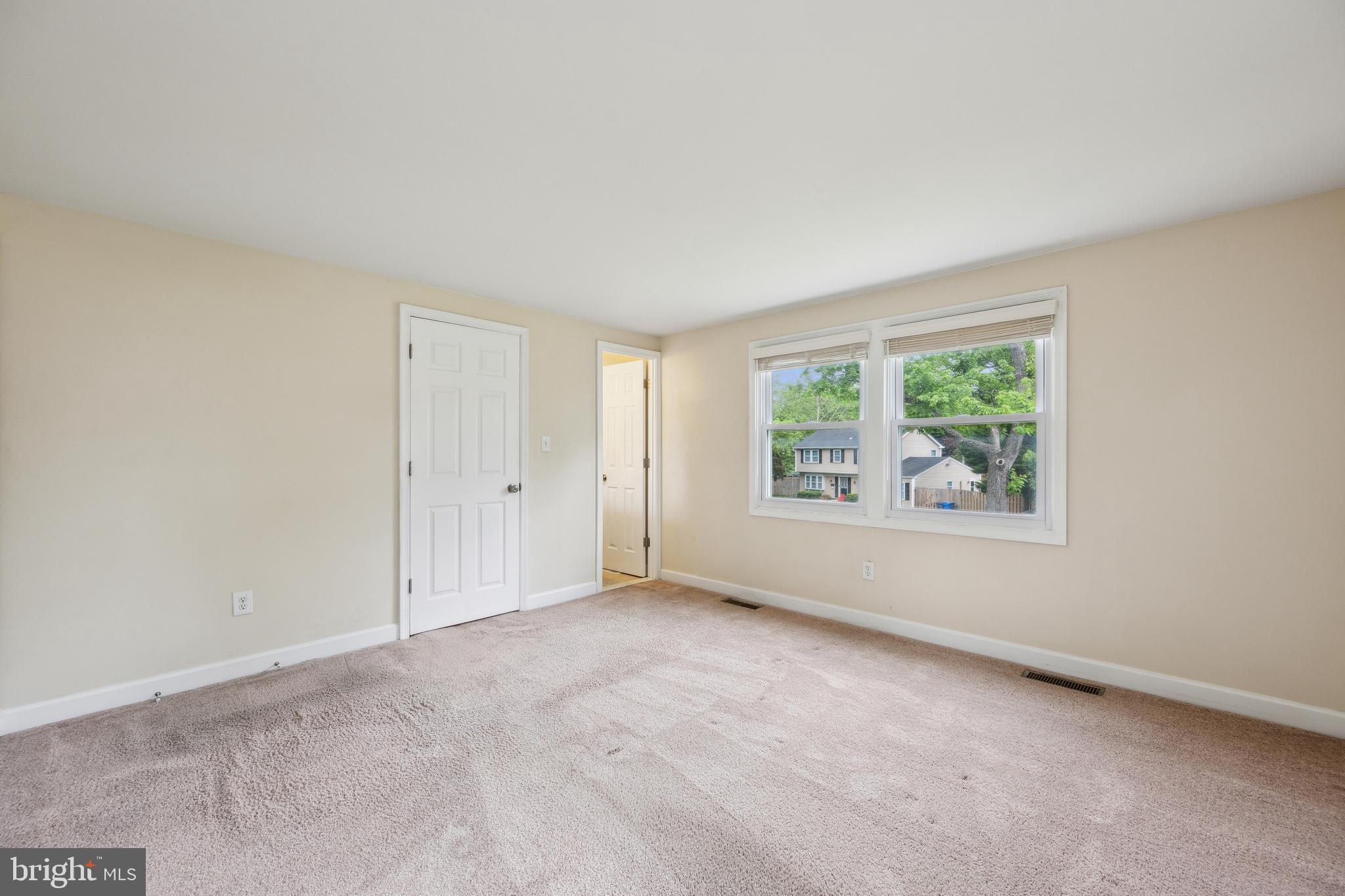 12430 Shadow Lane Bowie, MD 20715 - Photo 12 of 24 an empty room with windows