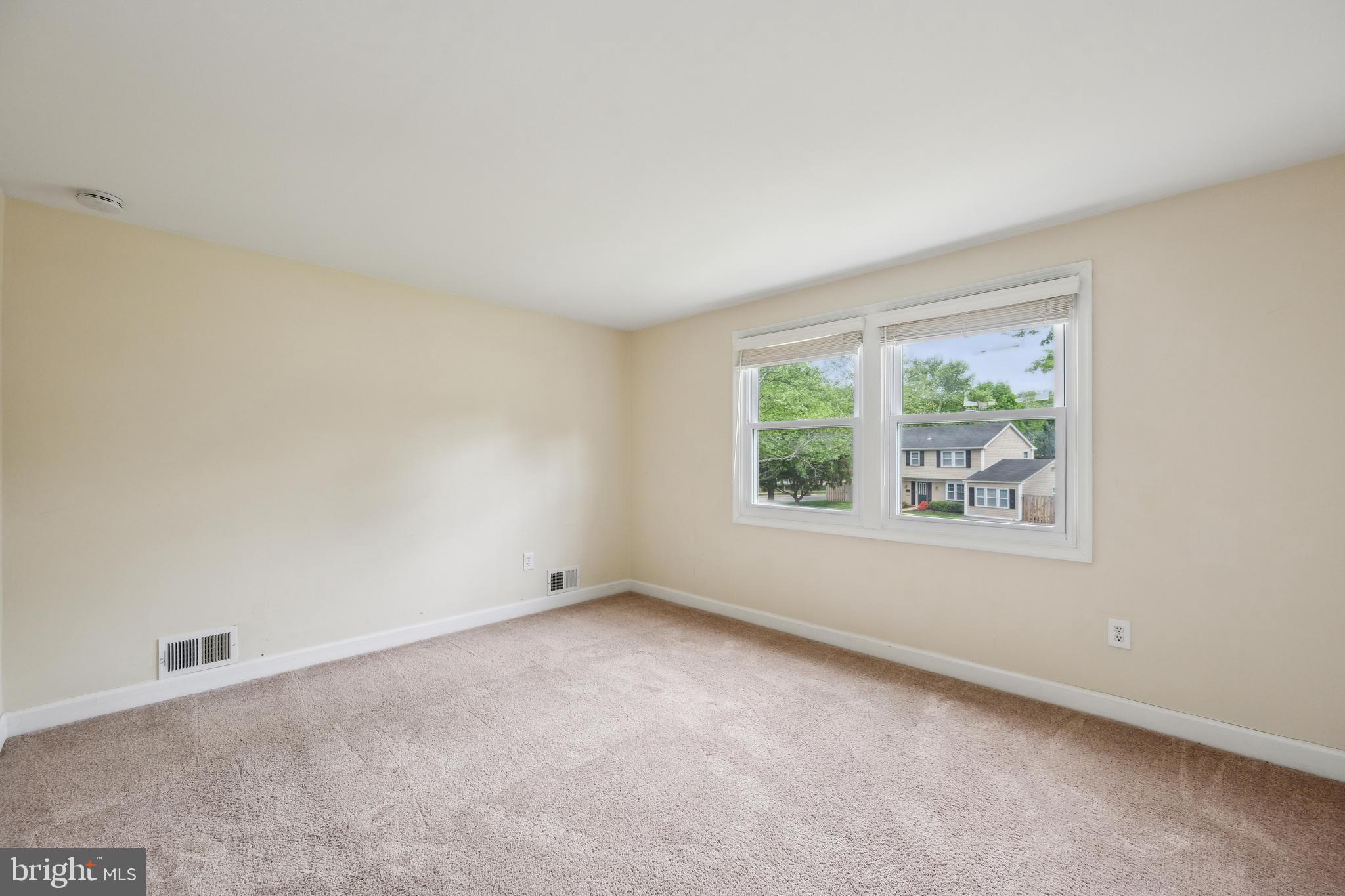 12430 Shadow Lane Bowie, MD 20715 - Photo 14 of 24 an empty room with windows