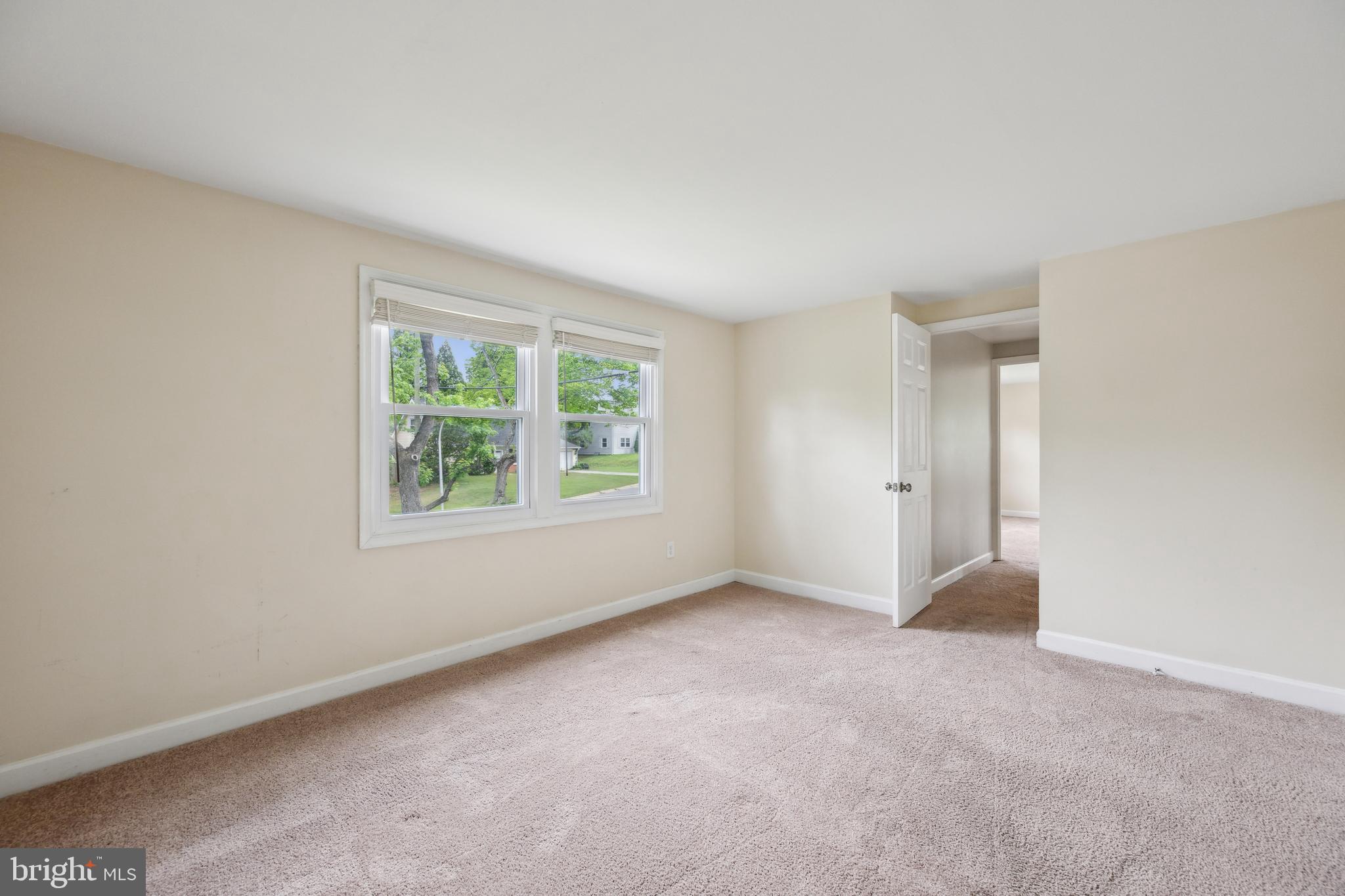 12430 Shadow Lane Bowie, MD 20715 - Photo 15 of 24 an empty room with windows