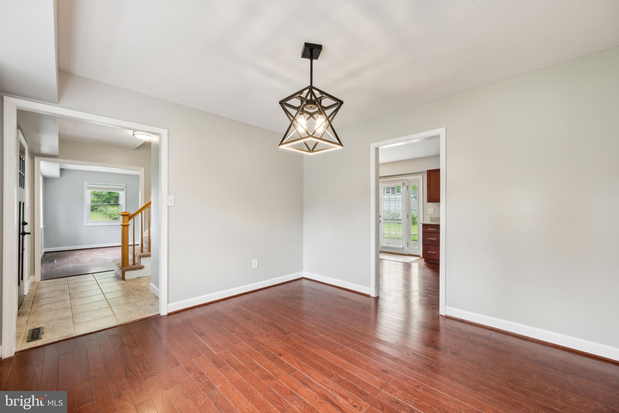 12430 Shadow Lane Bowie, MD 20715 - Photo 2 of 24 a view of empty room with wooden floor and window