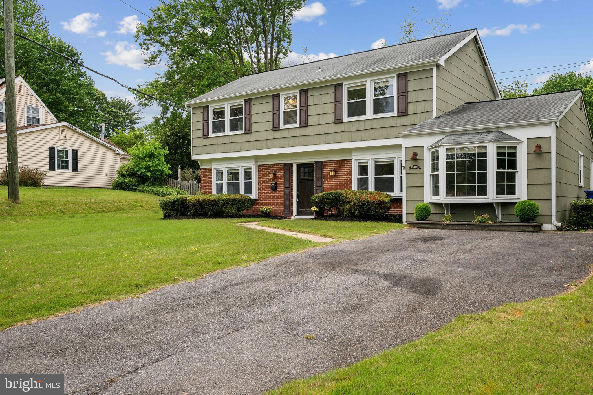 12430 Shadow Lane Bowie, MD 20715 - Photo 22 of 24 a house view with a garden space