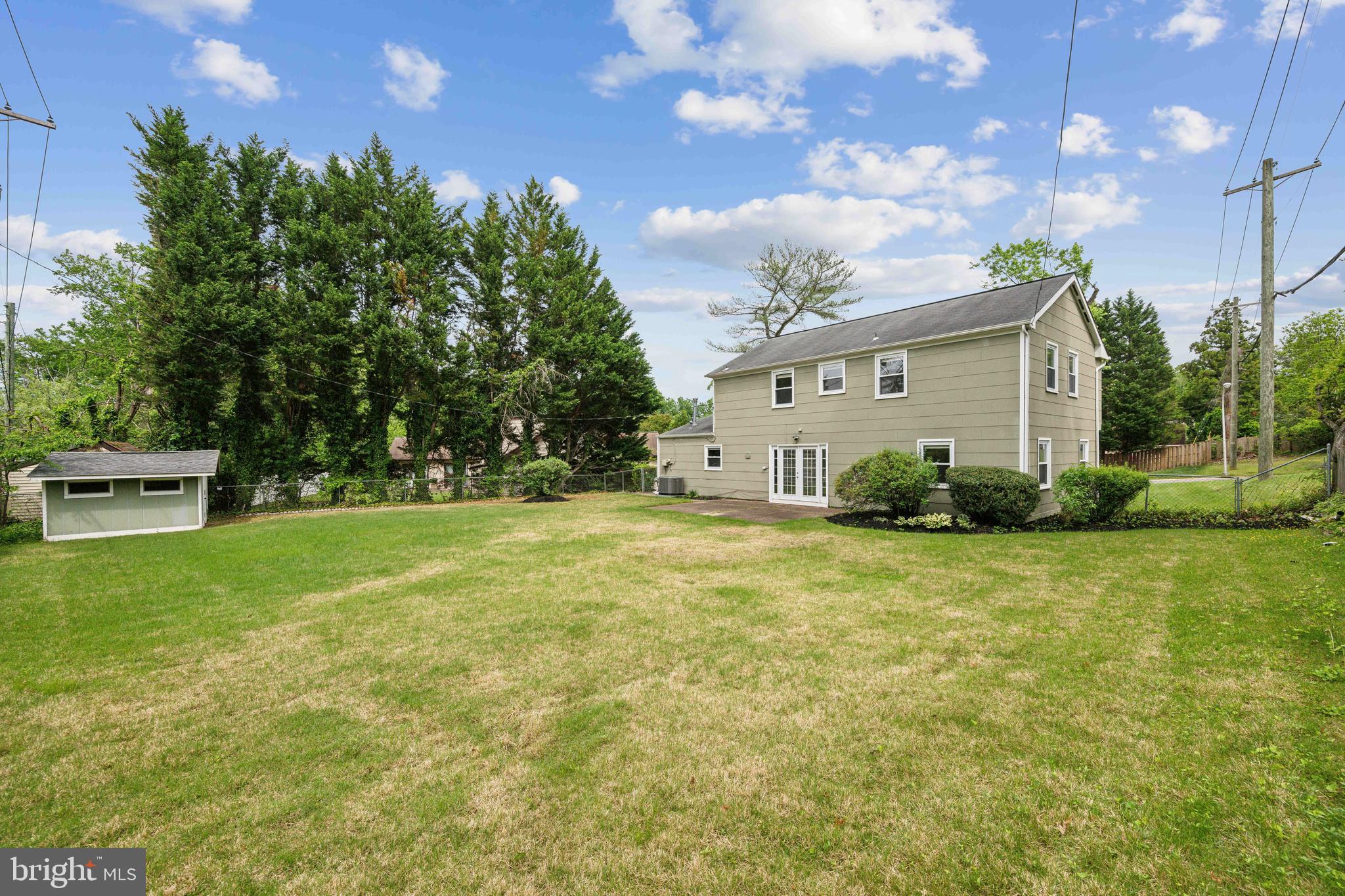 12430 Shadow Lane Bowie, MD 20715 - Photo 24 of 24 a front view of house with yard and trees