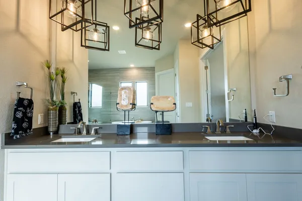 a kitchen with a refrigerator and a stove