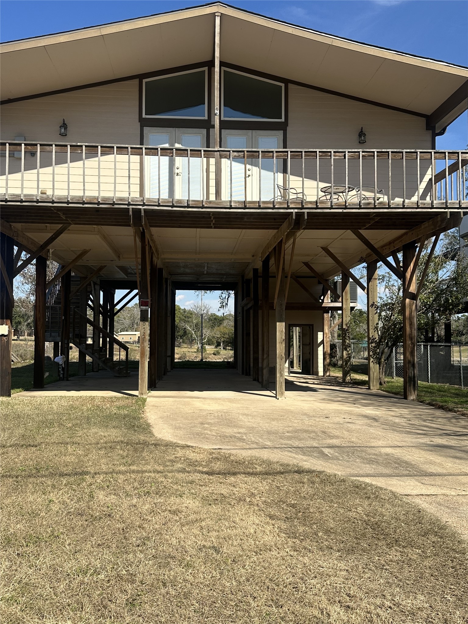 a view of a water fountain and a fireplace with a roof deck