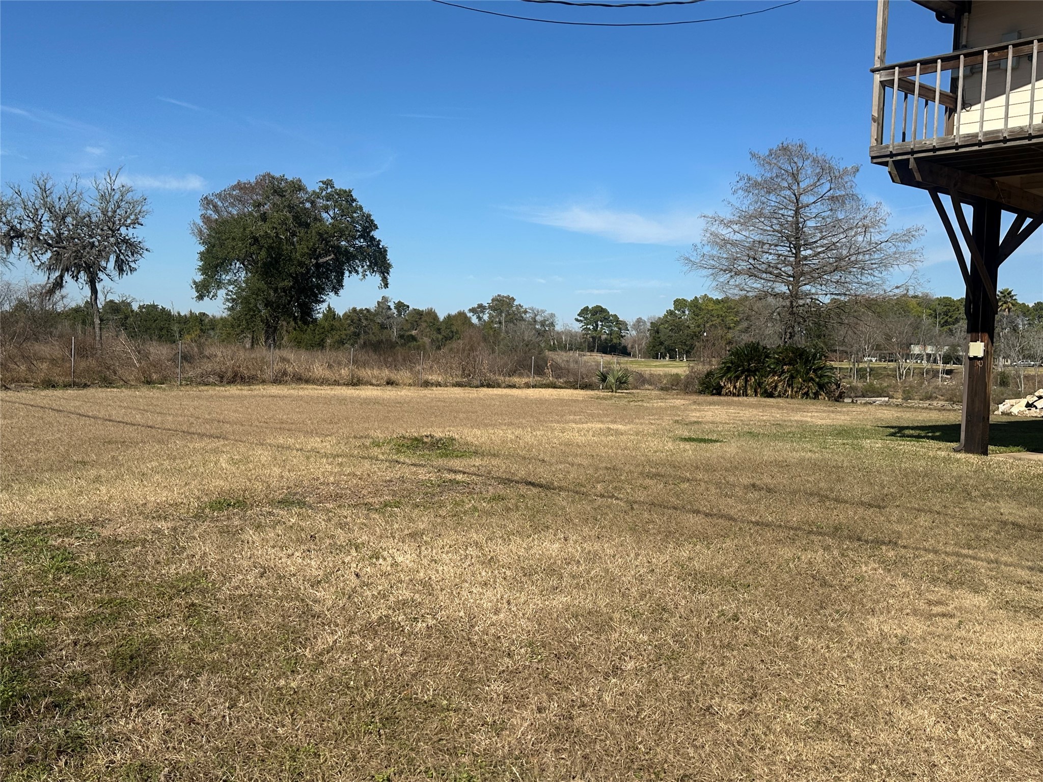20527 Rio Villa Drive Houston, TX 77049 - Photo 2 of 18 a view of a lake with a big yard