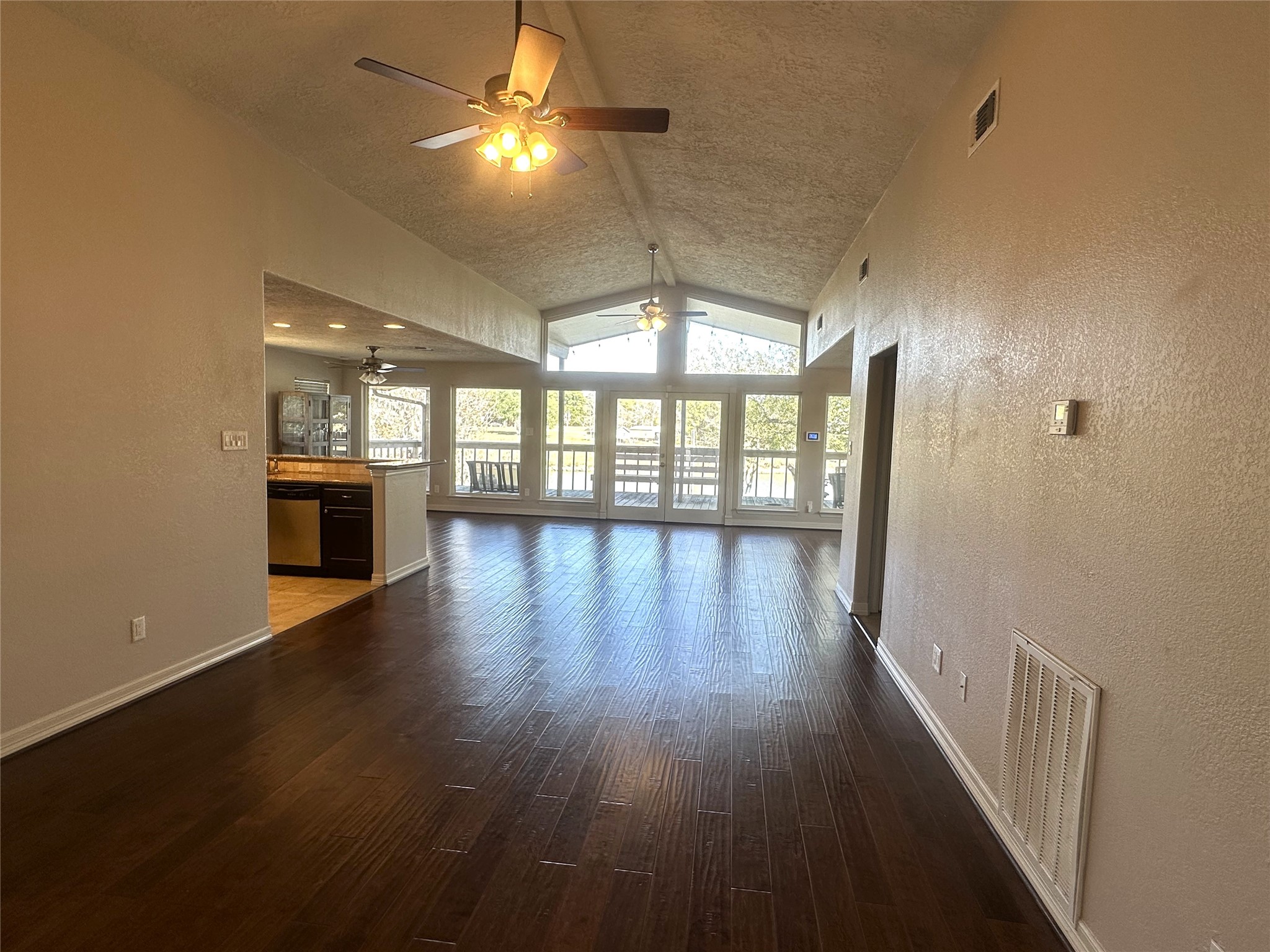 20527 Rio Villa Drive Houston, TX 77049 - Photo 8 of 18 wooden floor in an empty room with a window