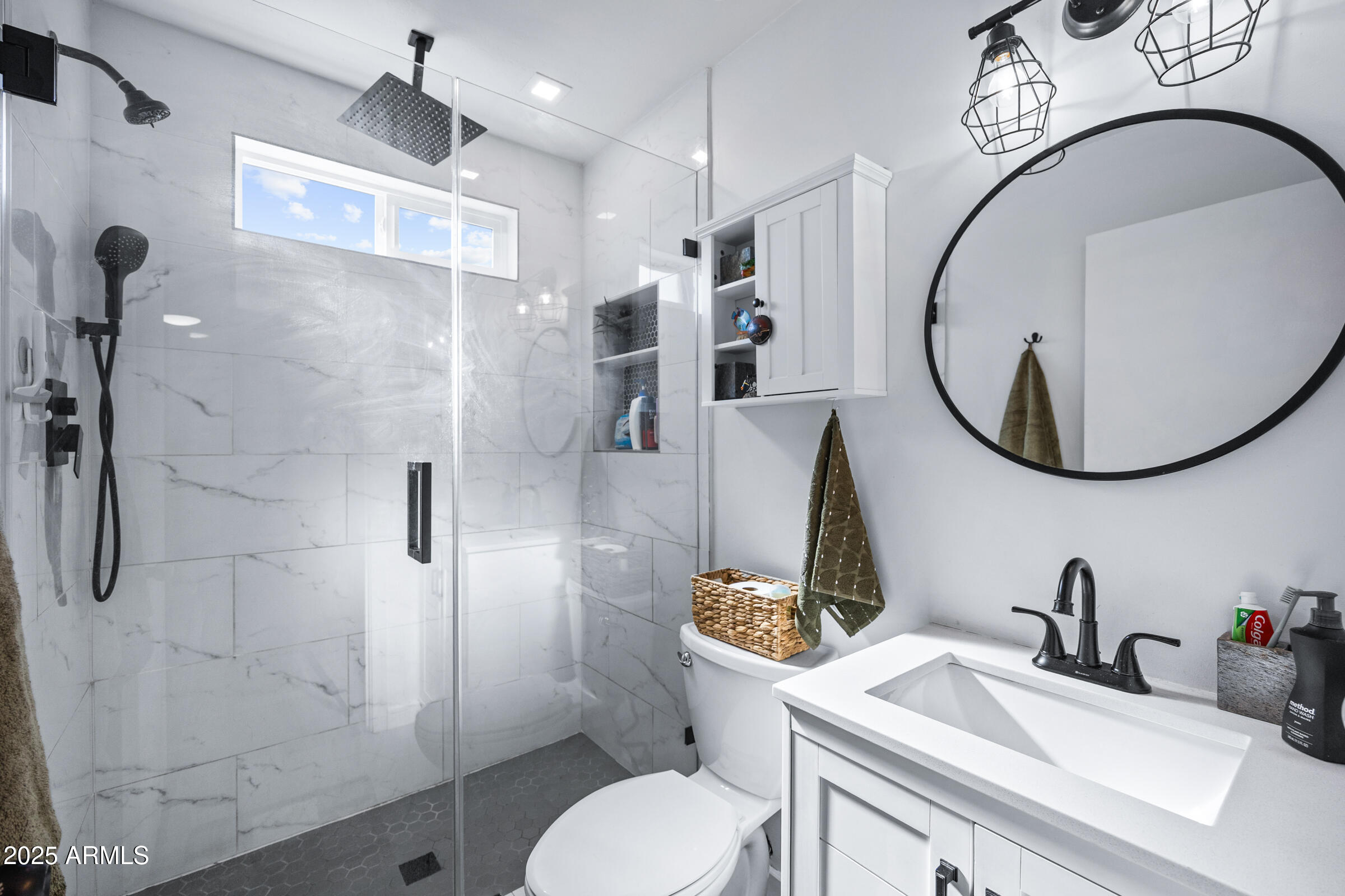 17827 North 9th Avenue Phoenix, AZ 85023 - Photo 16 of 29 a bathroom with a sink toilet and shower