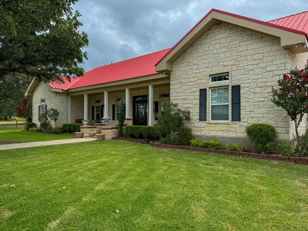 a backyard of a house with lots of green space