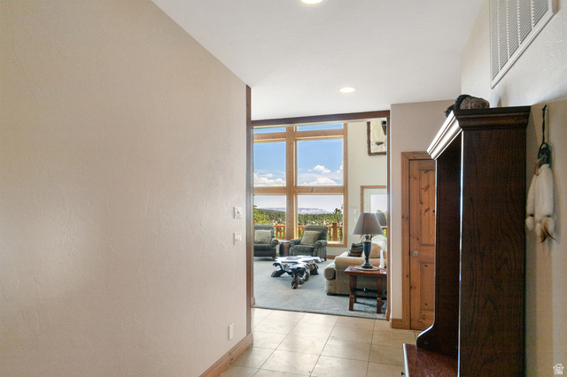 755 South Zion Ridge Drive Orderville, UT 84758 - Photo 29 of 84 Corridor with recessed lighting and light tile patterned flooring