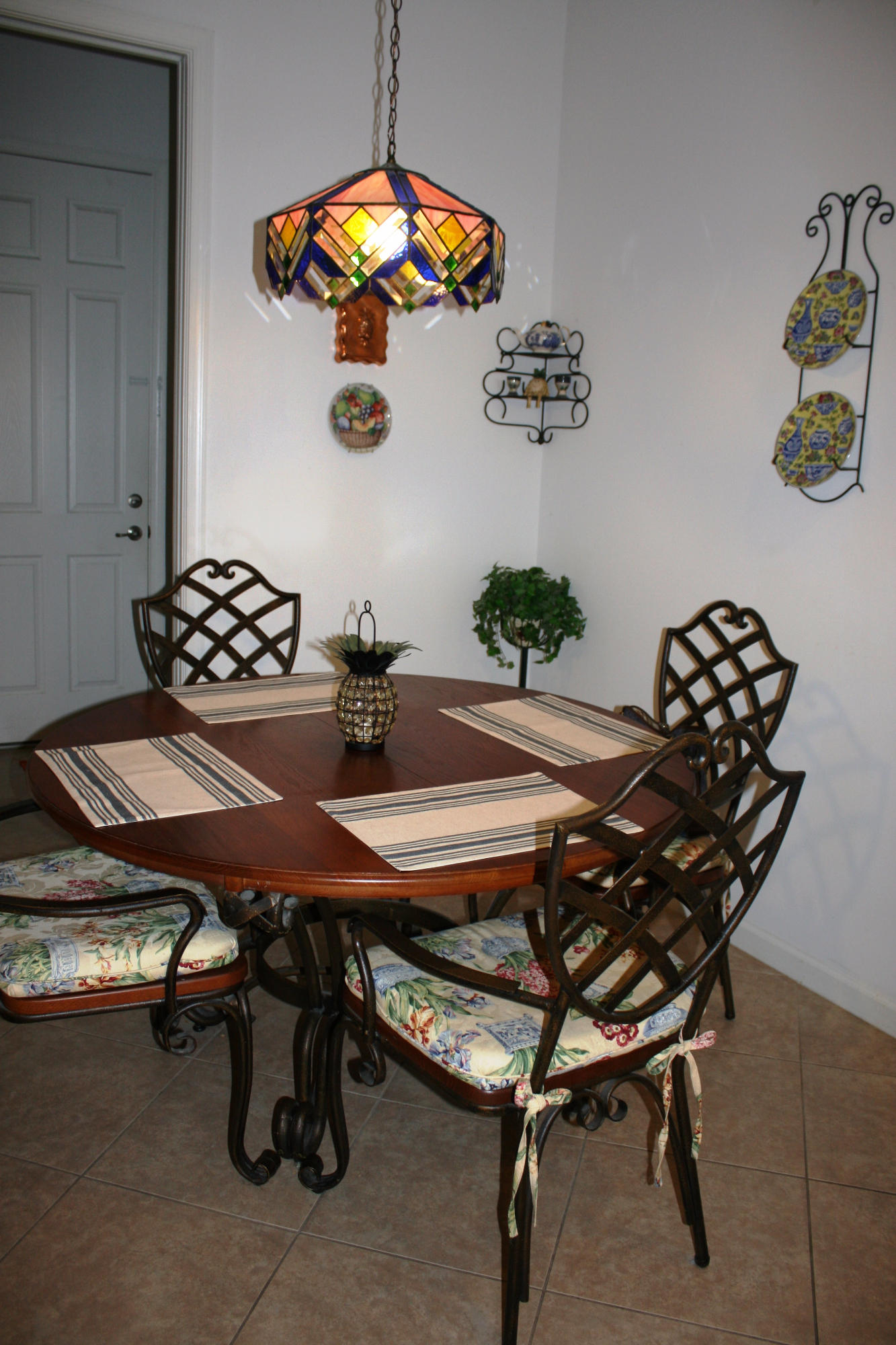 326 Southwest Walking Path Stuart, FL 34997 - Photo 11 of 49 a table room with a table and chairs