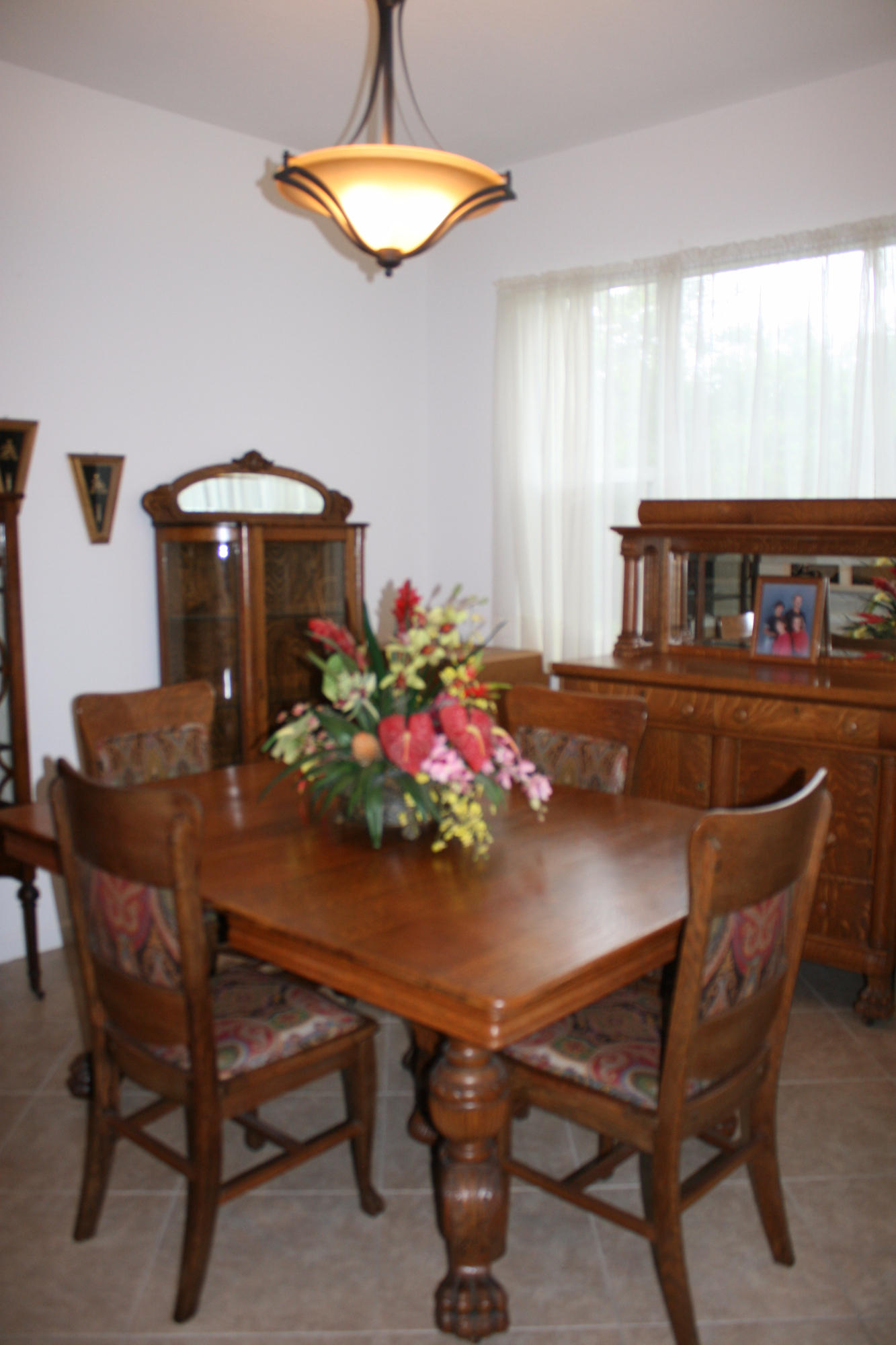 326 Southwest Walking Path Stuart, FL 34997 - Photo 15 of 49 a view of a dining room with furniture