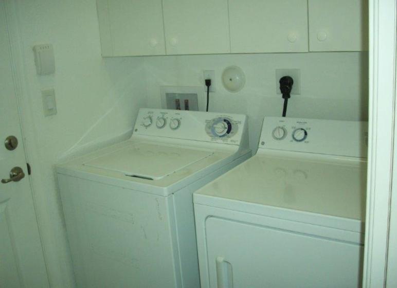 326 Southwest Walking Path Stuart, FL 34997 - Photo 16 of 49 a utility room with a shower