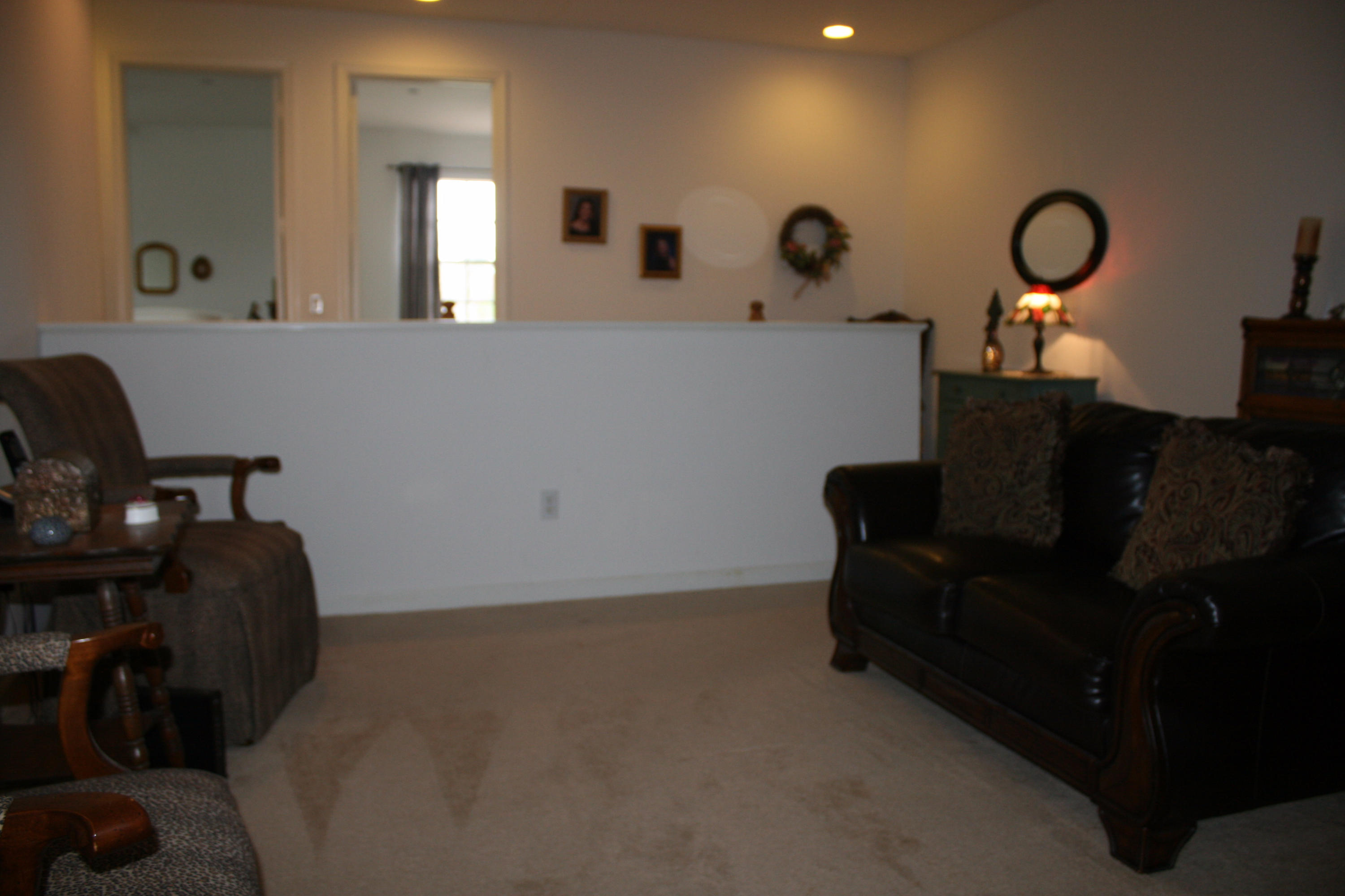 326 Southwest Walking Path Stuart, FL 34997 - Photo 20 of 49 a living room with furniture