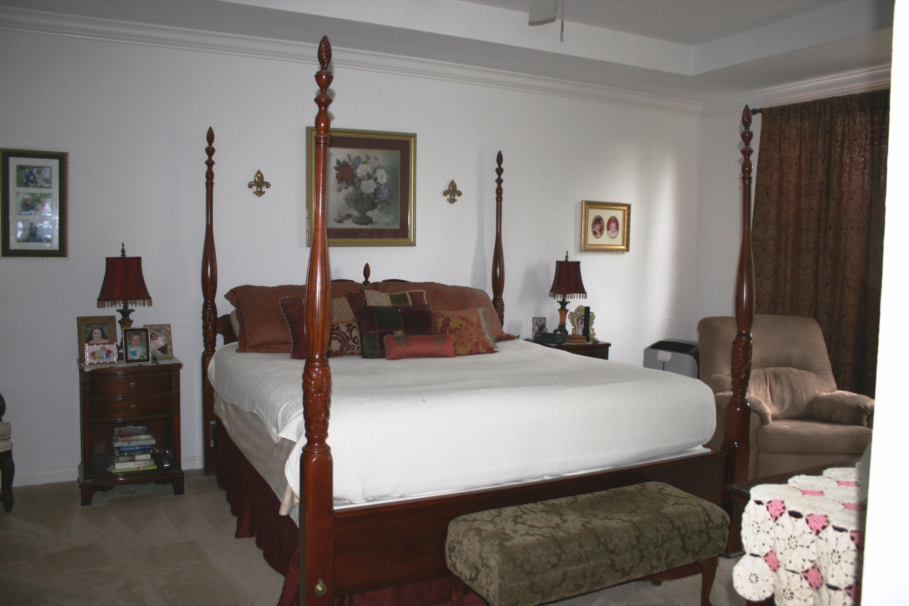 326 Southwest Walking Path Stuart, FL 34997 - Photo 24 of 49 a bedroom with a bed and a couch