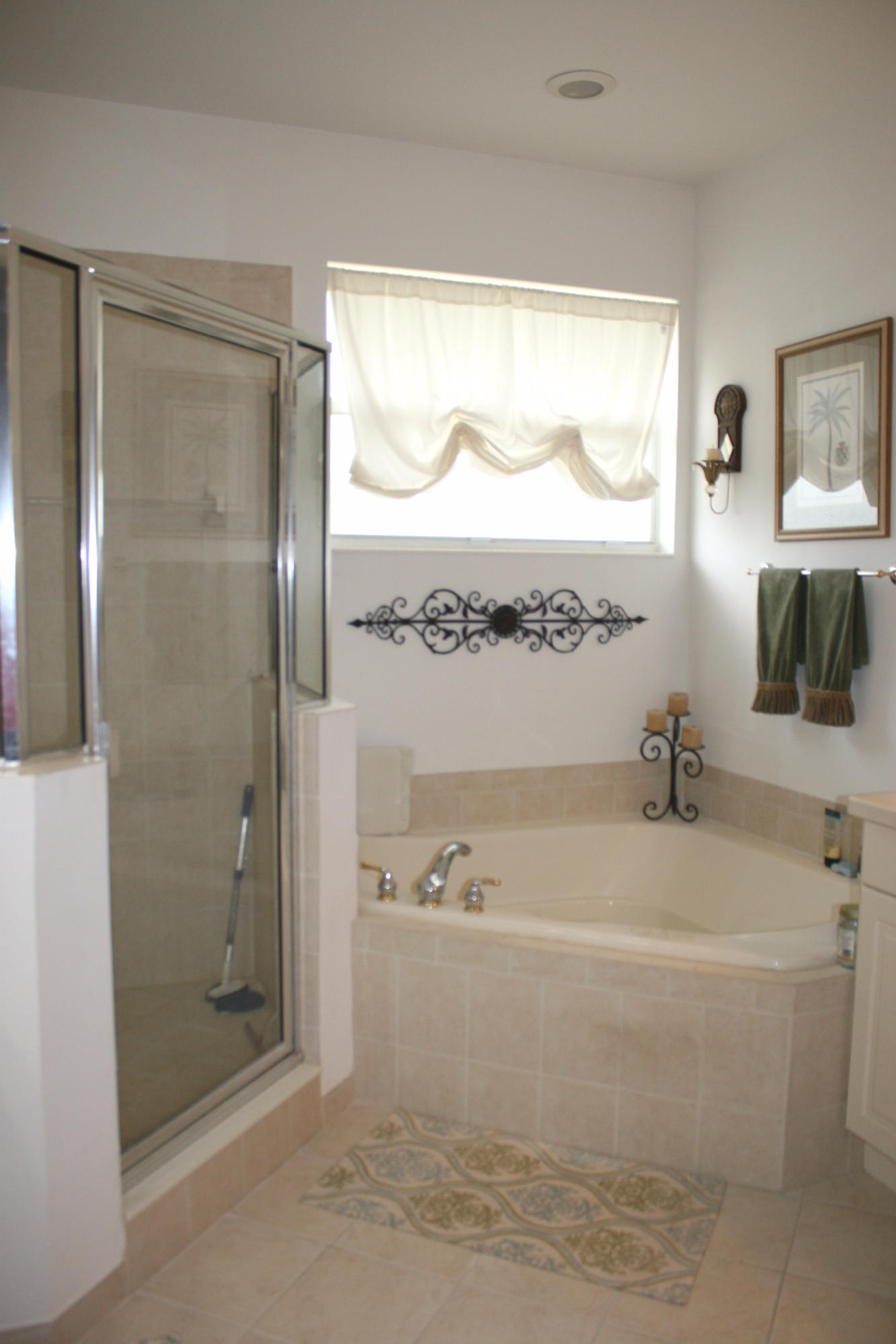 326 Southwest Walking Path Stuart, FL 34997 - Photo 26 of 49 a bathroom with a bathtub and a shower