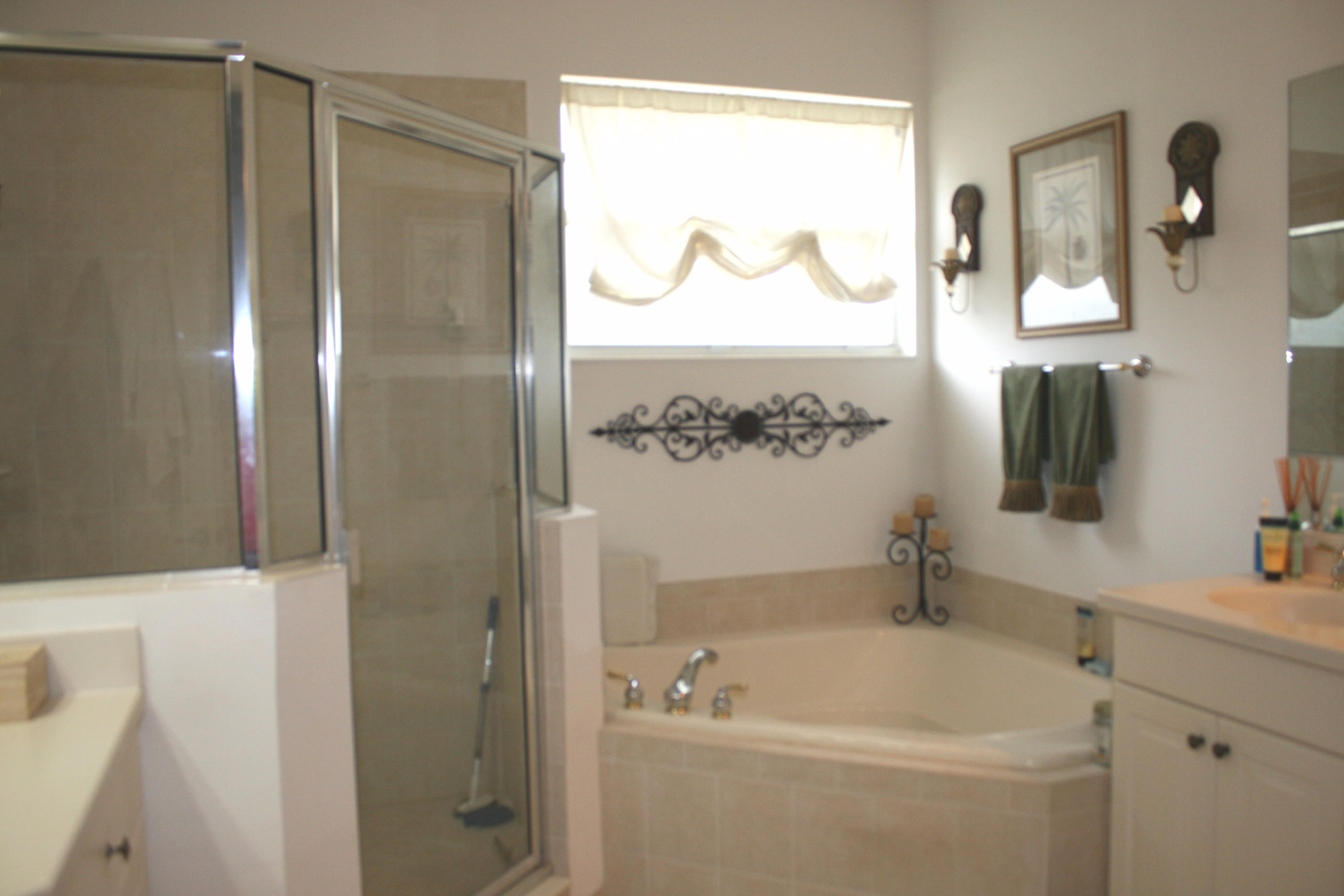 326 Southwest Walking Path Stuart, FL 34997 - Photo 27 of 49 a bathroom with a bathtub and a sink