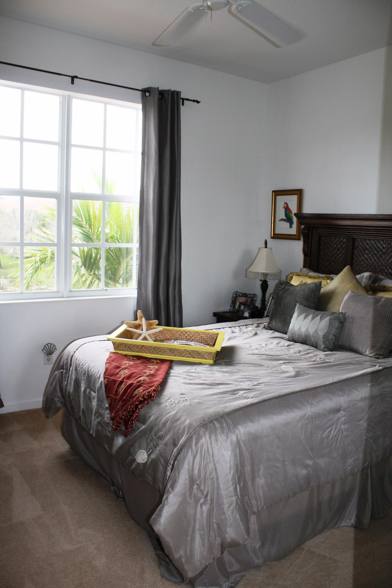 326 Southwest Walking Path Stuart, FL 34997 - Photo 35 of 49 a bedroom with a bed and window