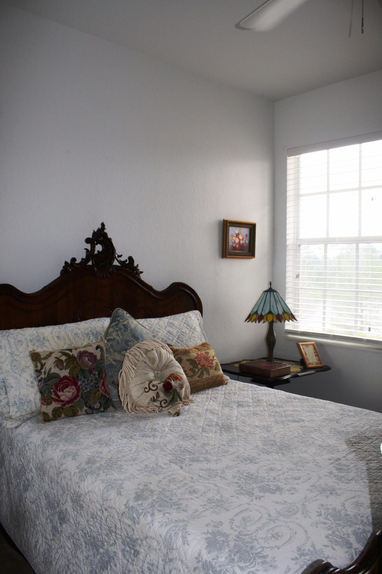 326 Southwest Walking Path Stuart, FL 34997 - Photo 36 of 49 a bedroom with a bed and window