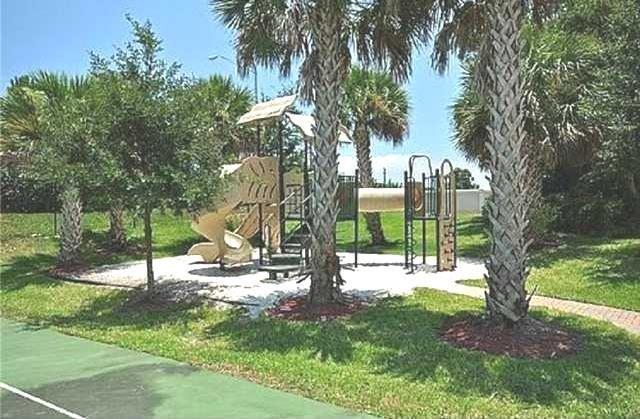 326 Southwest Walking Path Stuart, FL 34997 - Photo 44 of 49 a view of a park with trees