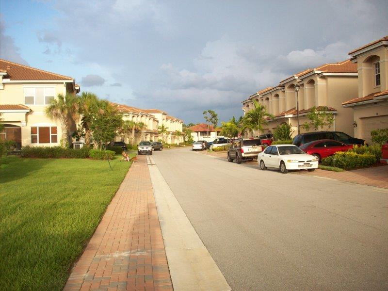 326 Southwest Walking Path Stuart, FL 34997 - Photo 46 of 49 a view of street with cars
