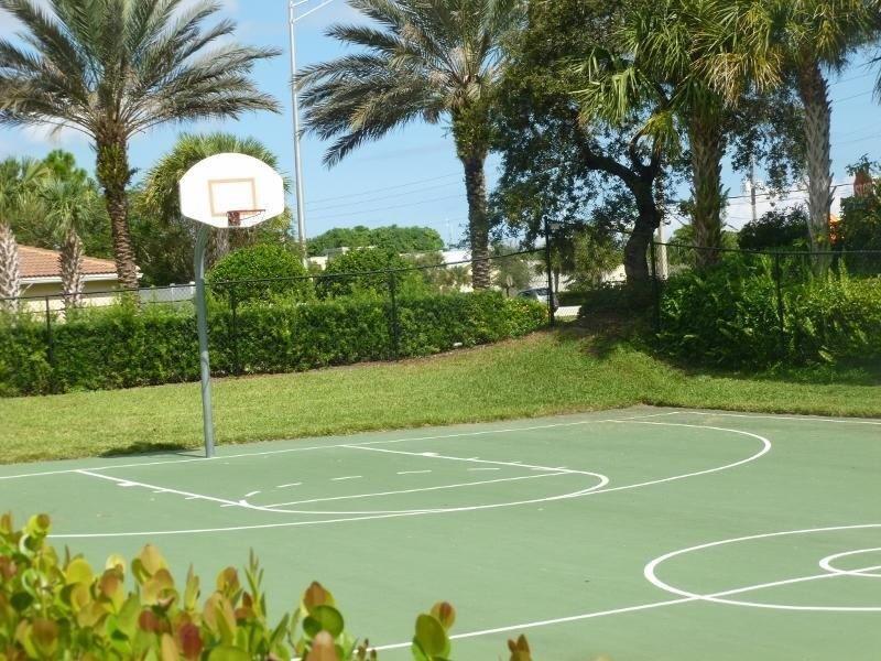 326 Southwest Walking Path Stuart, FL 34997 - Photo 48 of 49 a view of a tennis court