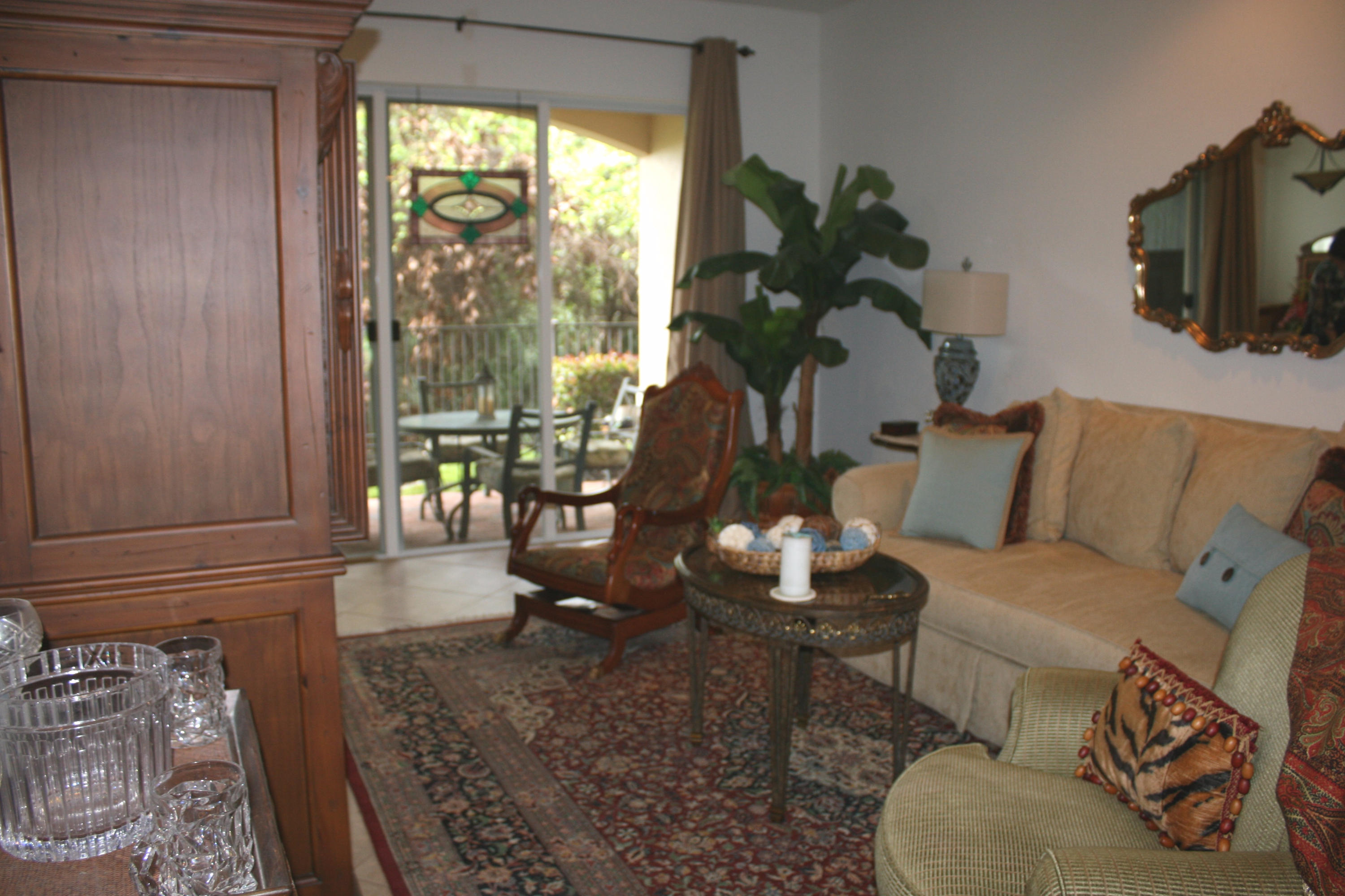 326 Southwest Walking Path Stuart, FL 34997 - Photo 7 of 49 a living room with furniture and a flat screen tv