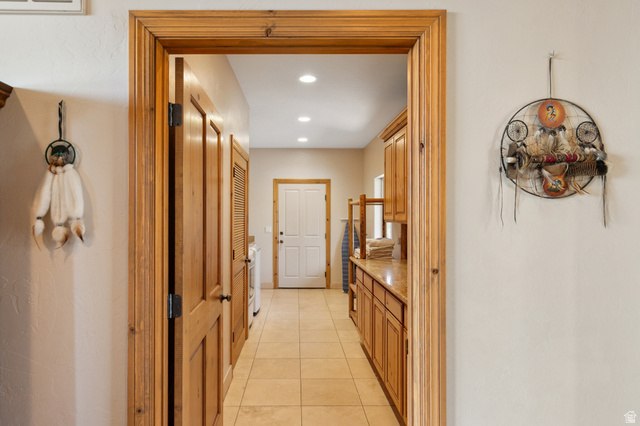 755 South Zion Ridge Drive Orderville, UT 84758 - Photo 30 of 84 Hallway with recessed lighting and light tile patterned floors